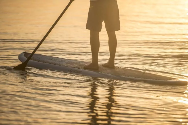 Paddler at sunset on the Hobie Evalution paddleboard