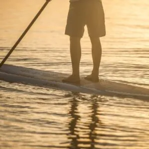 Paddler at sunset on the Hobie Evalution paddleboard