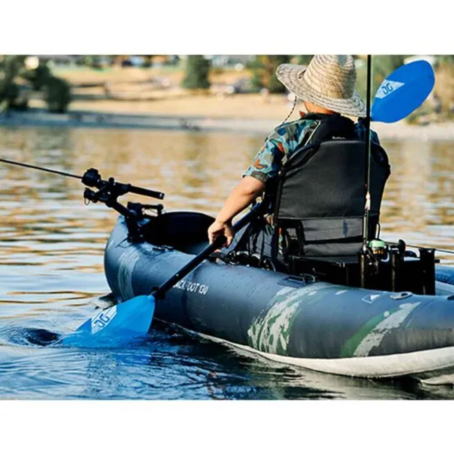 A man paddling the new 2021 Aquaglide Blackfoot Angler 130 inflatable kayak.