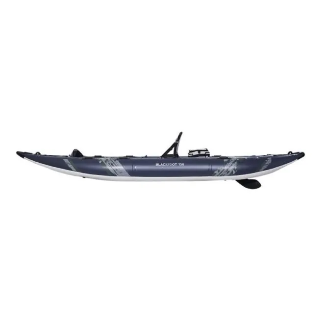 The Aguaglide Blackfoot Angler 130 inflatable kayak side view. Showing the Weedless fin and dark blue and grey graphics on the pontoon.