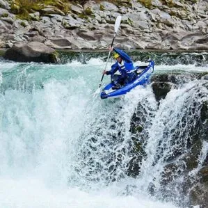 Image of the Aquaglide Klickitat kayak on drop on the river.