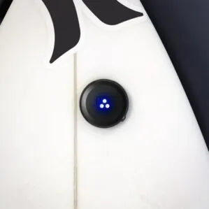 Trace mounted on surfboard