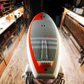 Infinity SUP Wide Aquatic top in orange and gray tail view designed by Steve Boehne.
