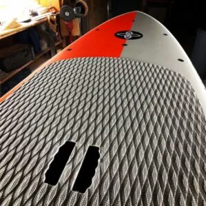 Infinity SUP Wide Aquatic top in orange and gray deck pad view designed by Steve Boehne.