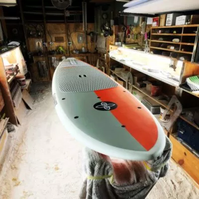 Infinity SUP Wide Aquatic top in orange and gray front view designed by Steve Boehne.