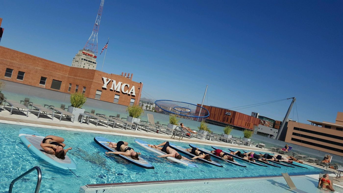 Paddleboard fitness at the down town ASU Roof Top Pool .