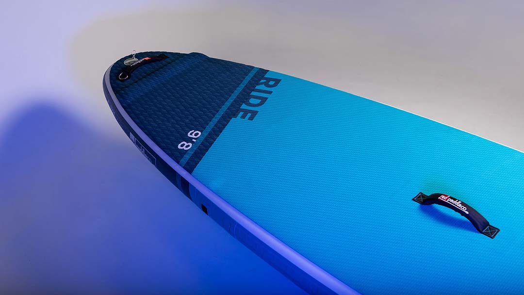 The 2021 Red Paddle Co Ride 9'8" deck section of the tail. The Ride is available at Riverbound Sports.