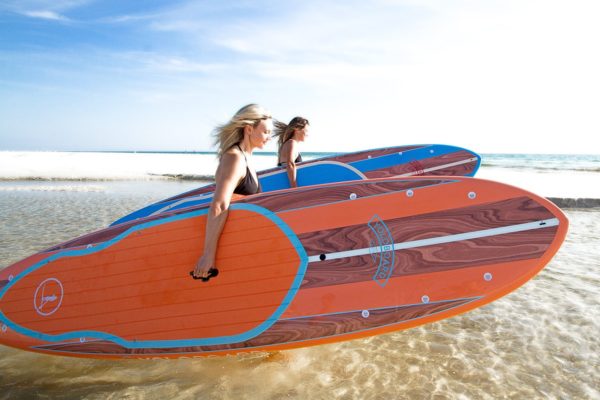 Mango and wood Harbor Stripe paddleboards by Yolo Boards