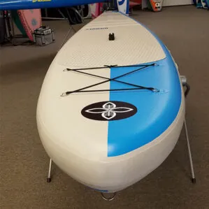 Shop photo at Riverbound Sports of the Infinity SUP Wide Aquatic Air inflatable in blue.