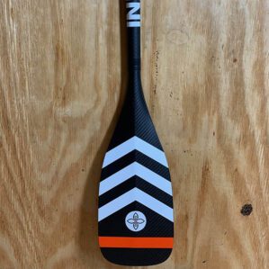 Infinity SUP carbon blade with white and orange strips.