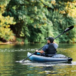 A man paddling the Aquaglide Chelan 120.