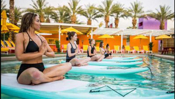 Sunset SUP Yoga on the Saguaro Hotel poopl with Riverbound Sports