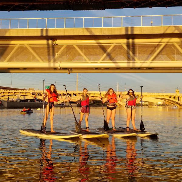 The Phoenix area Girl Scouts learning to paddleboard with Riverbound Sports