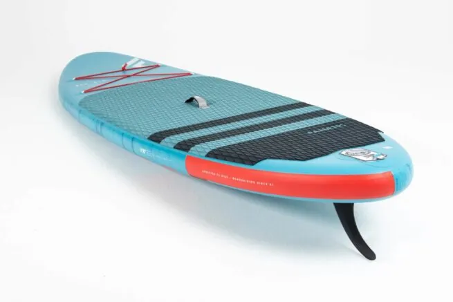 The Fanatic SUP Fly Air Inflatable Paddleboard in teal blue front deck side tail image.