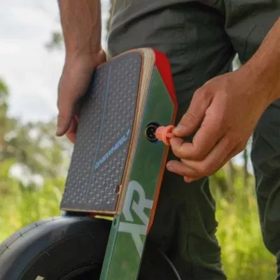 Coral OneWheel XR Plug with dark olive rail guards. 