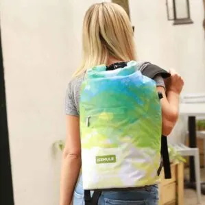 A girl with the devoe IceMule Jaunt backpack cooler over her shoulder