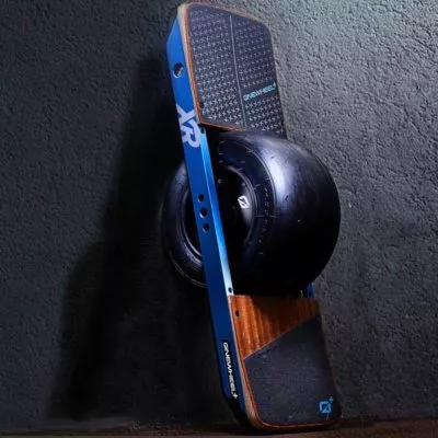 OneWheel XR by Future Motion leaning up against the wall at Riverbound Sports.