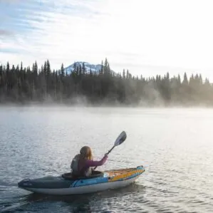 The Aquaglide Novo 90 kayak on the misty lake.