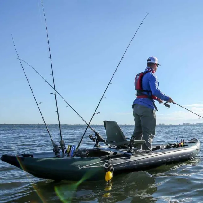 Fisherman standing the Sea Eagle 350FX kayak fishing.