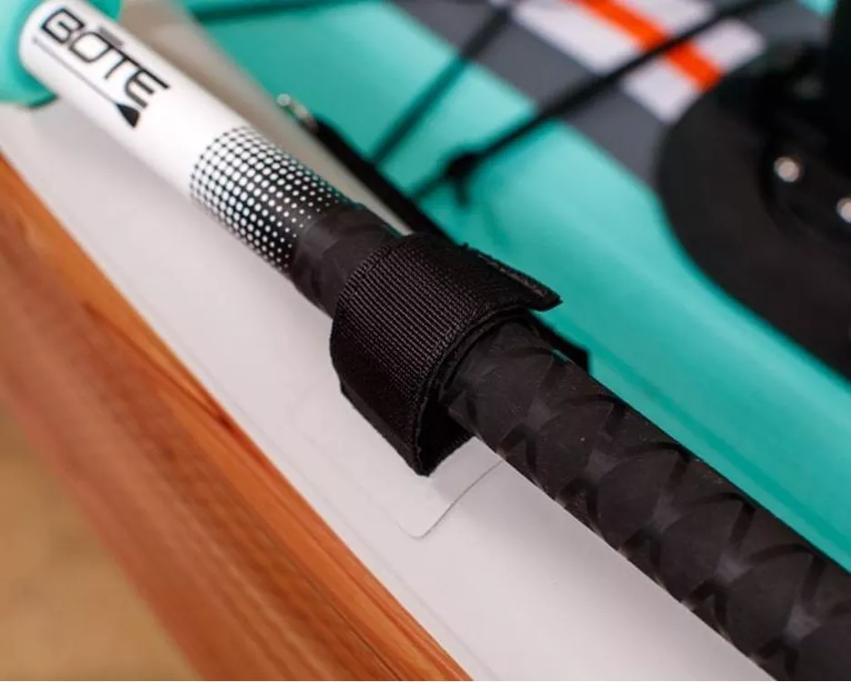 Bote velcro paddle straps are located on both the left and right side of the LONO Aero.