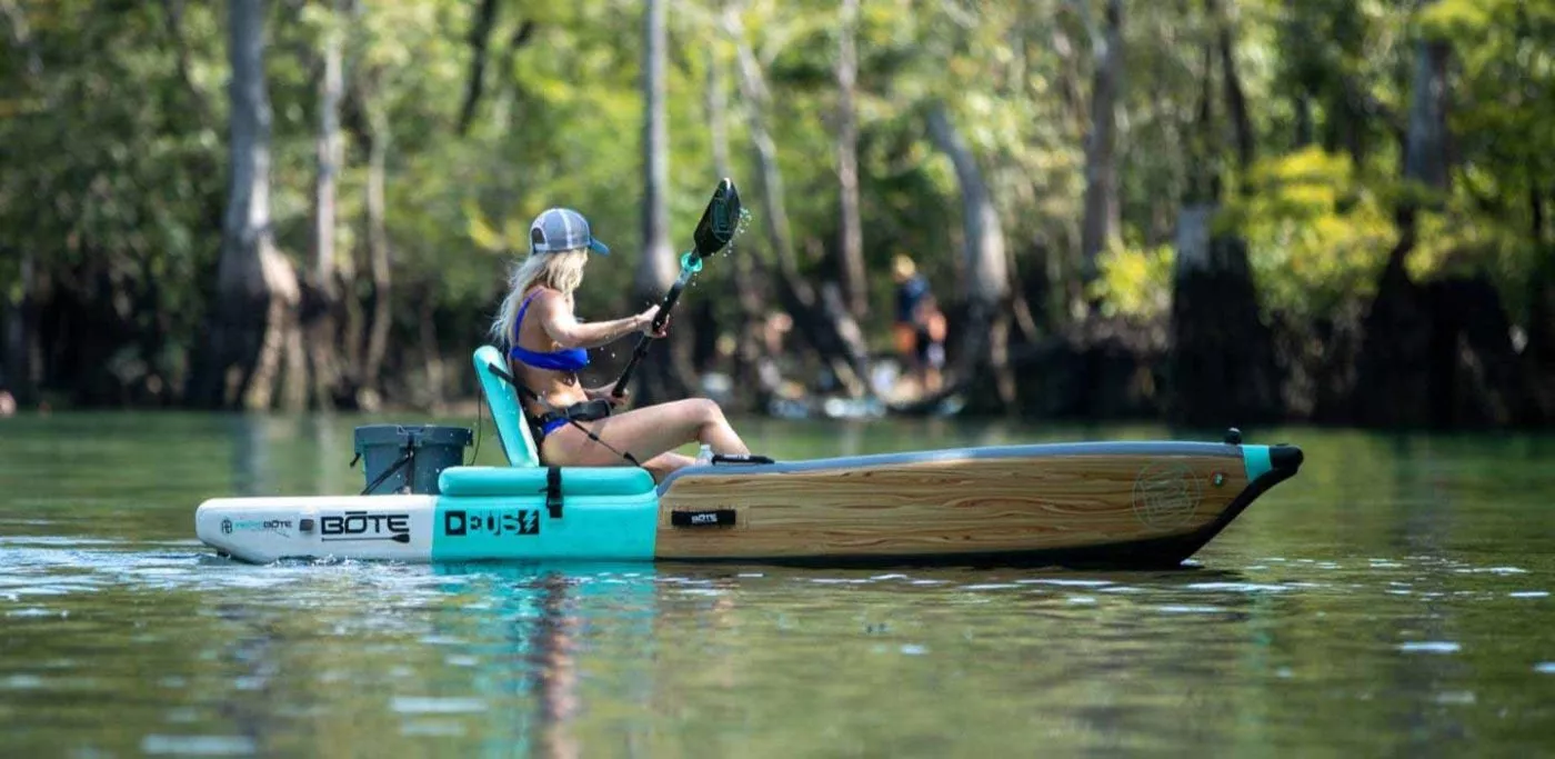 A women paddling the classic Bote DEUS sit-on-top kayak and SUP. Available at Riverbound Sports in Tempe, Arizona.