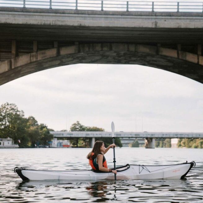 Paddling on the water in the Oru Kayak Bay ST. Available at Riverbound Sports store in Tempe, Arizona.