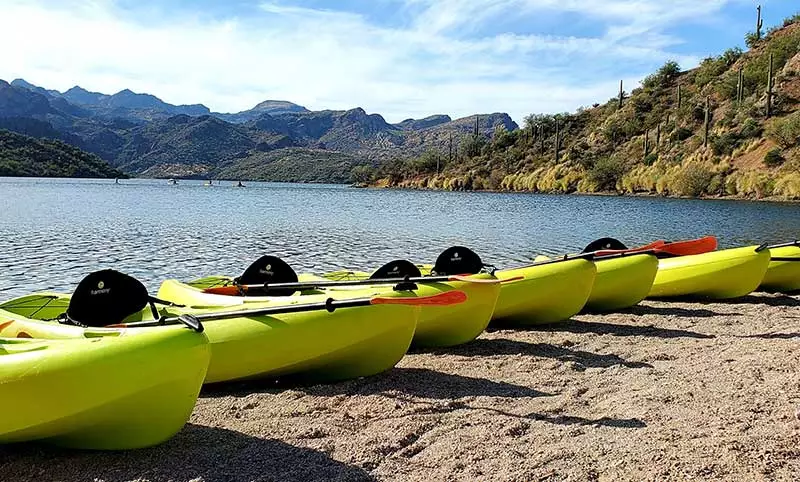 Kayaks on the lakeside at Butcher Jones Recreation Site for Riverbound Sports Saguaro Lake kayak rental.