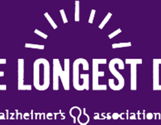 The Longest Day Paddle to fight Alzheimer's logo in purple with white writing.