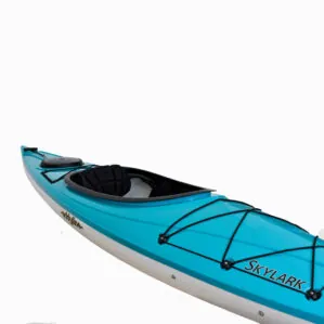 Blue Eddyline Skylark kayak on white background.
