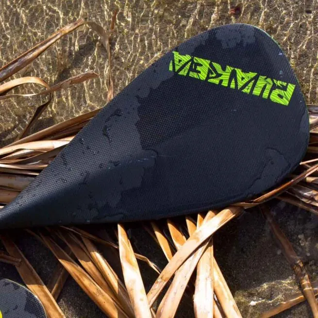 The Puakea Designs Hopu OC6 carbon blade, green Puakea logo. Available at Riverbound Sports in Tempe, Arizona.