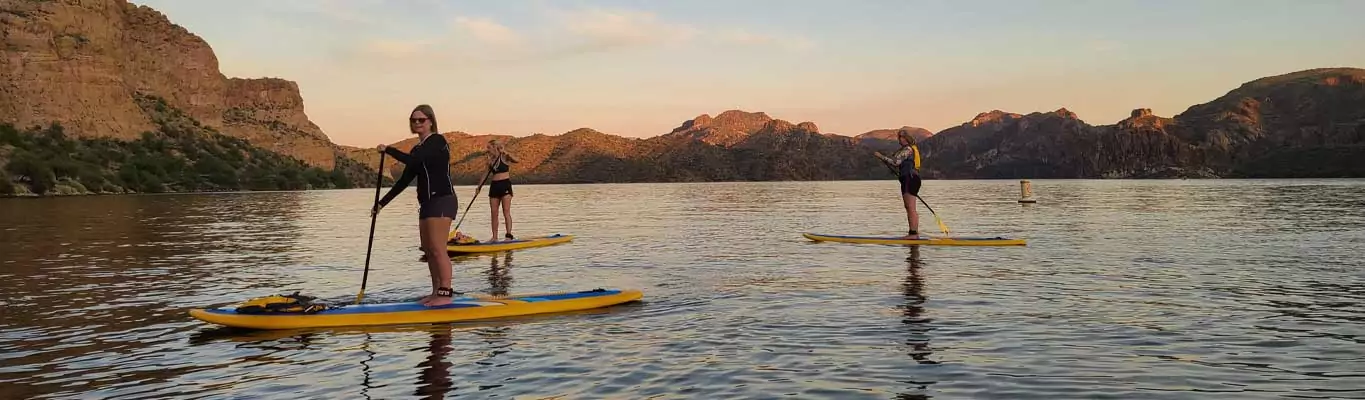 Paddleboarding on Saguaro Lake in Phoenix, Arizoa. Riverbound Sports in Tempe, AZ tours and rentals.