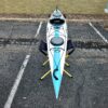 Stellar S16 G3 touring Kayak in teal and white.
