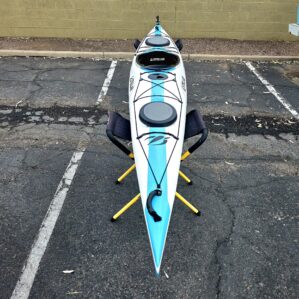 Stellar S16 G3 touring Kayak in teal and white.