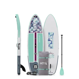 A product display of the BOTE Wulf Aero Inflatable Paddle Board package. It shows the front and back of the teal and white board, a side profile, a 3-piece adjustable paddle, a grey travel bag with teal straps, and a coiled leash.