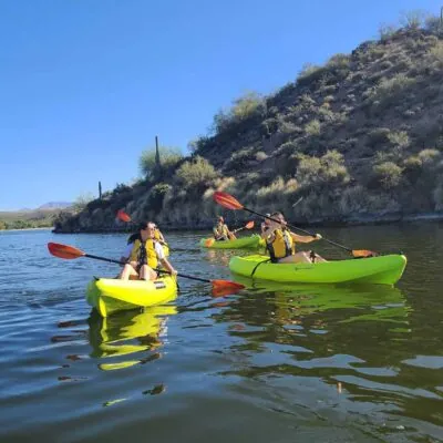 A group of kayakers exploring Saguaro Lake. Riverbound Paddle Company Tour