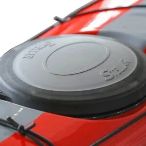 Red car's diesel fuel cap close-up.