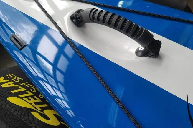 Blue race car hood with handle and decals.
