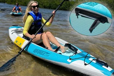 Sea Eagle EZLite10 Foot Bracket shown when a lady is paddling. Available at Riverbound Sports.