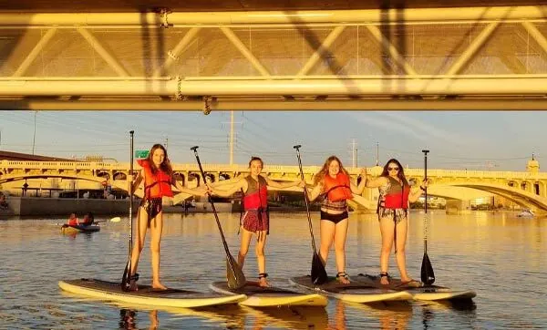 The Phoenix area Girl Scouts learning to paddleboard with Riverbound Sports