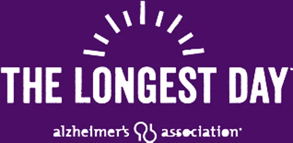 The Longest Day Paddle to fight Alzheimer's logo in purple with white writing.